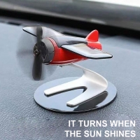 Solar Powered Airplane Car Ornament for Center Console Decoration and Air Freshening.