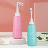 Portable Handheld Bidet Sprayer for Postpartum Hygiene and Perineal Care in Shower.