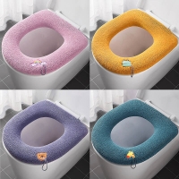 Thick U-shaped Toilet Seat Cover with Handle and Soft Plush Material - All Seasons Comfort.